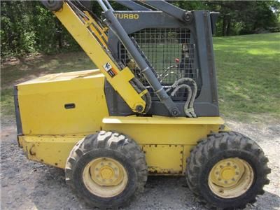 NEW HOLLAND LS180, SMOOTH BUCKET, GOOD TIRES, SKID STEER LOADER  